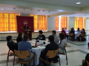 Assistant Dean of Admissions and Financial Aid Rita Simpson addresses the students and faculty at lunch.